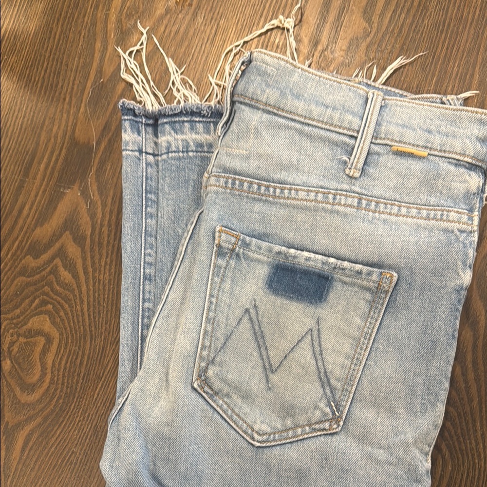 Light Blue Denim Jeans with Frayed Hem
